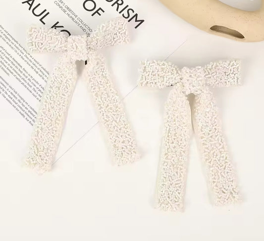 Elegant bow hair clip with seed beads